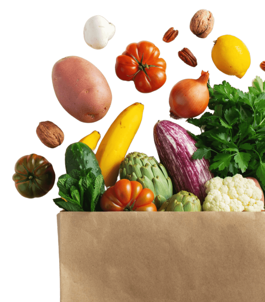 grocery bag with fruit and vegetables coming out of it